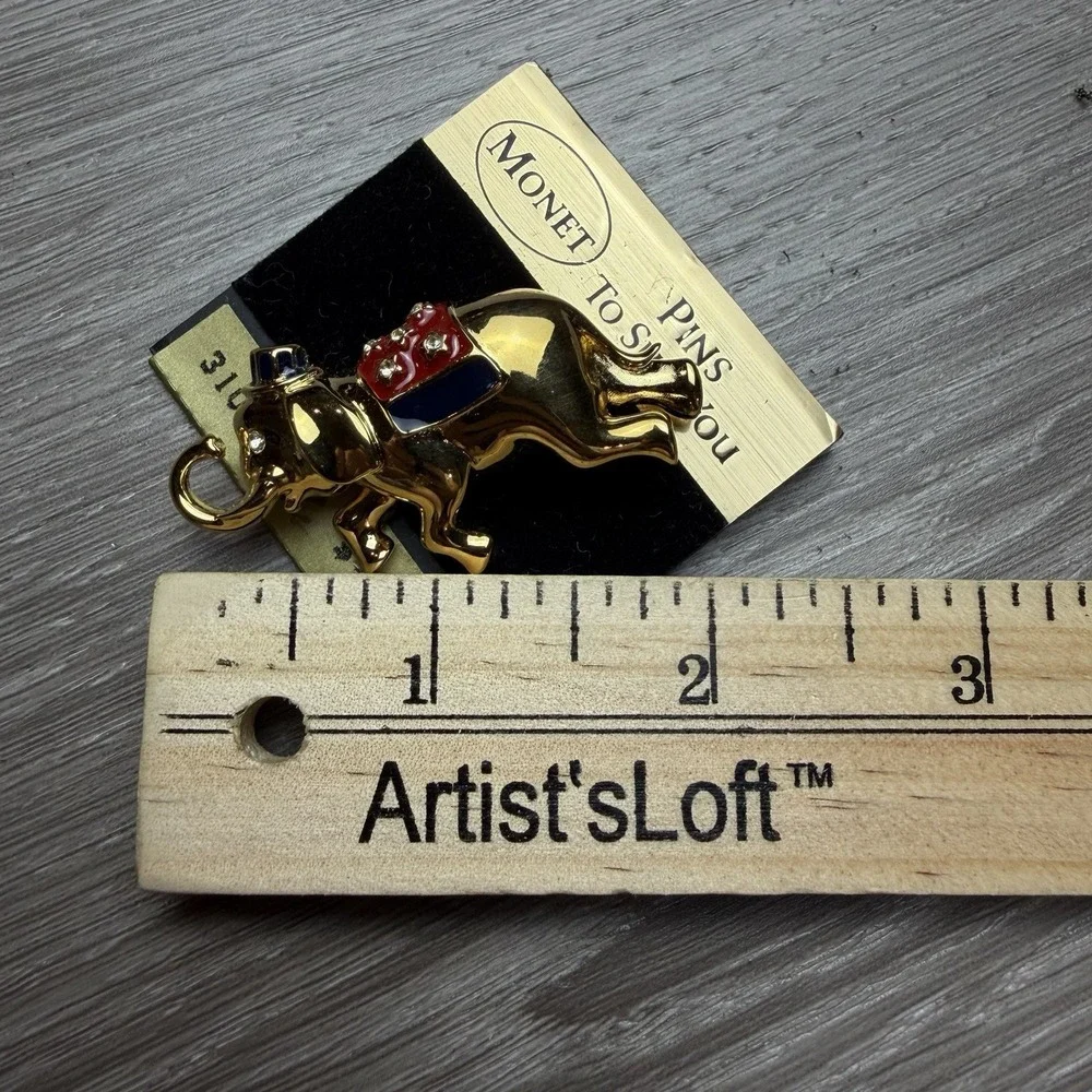 Vintage Monet Patriotic Elephant Brooch Pin Gold Tone Red White Blue Enamel NOS